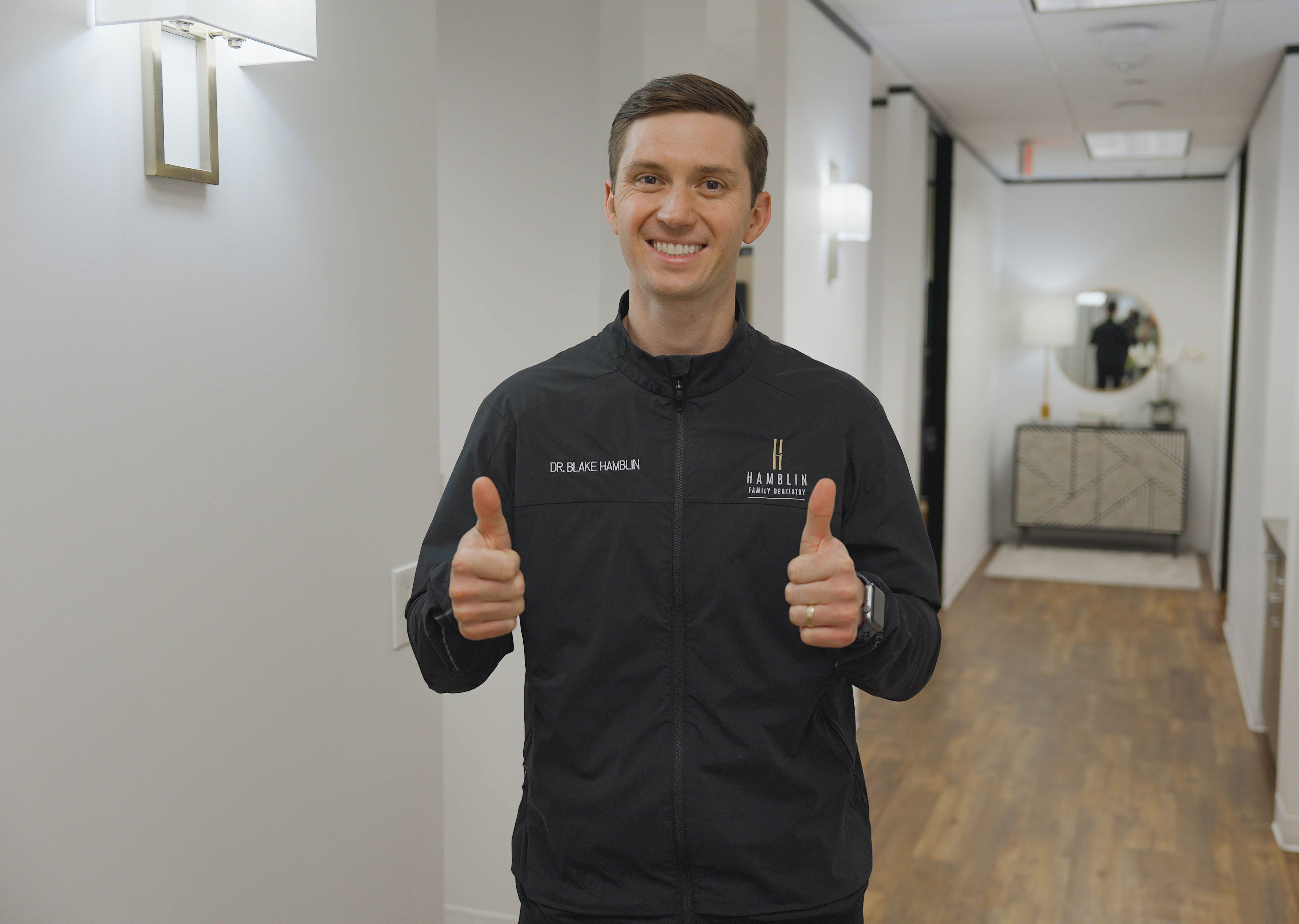 Dr. Blake Hamblin sharing a welcoming smile in the practice