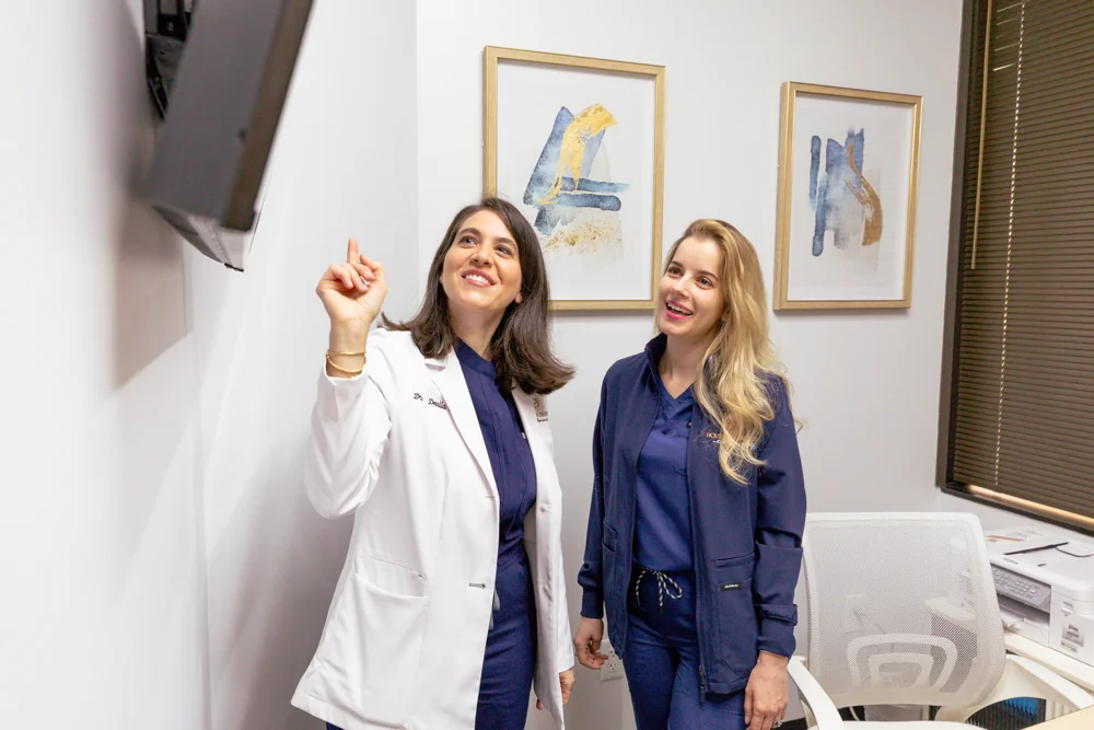 The Houston Dentistry team discussing a personalized treatment plan