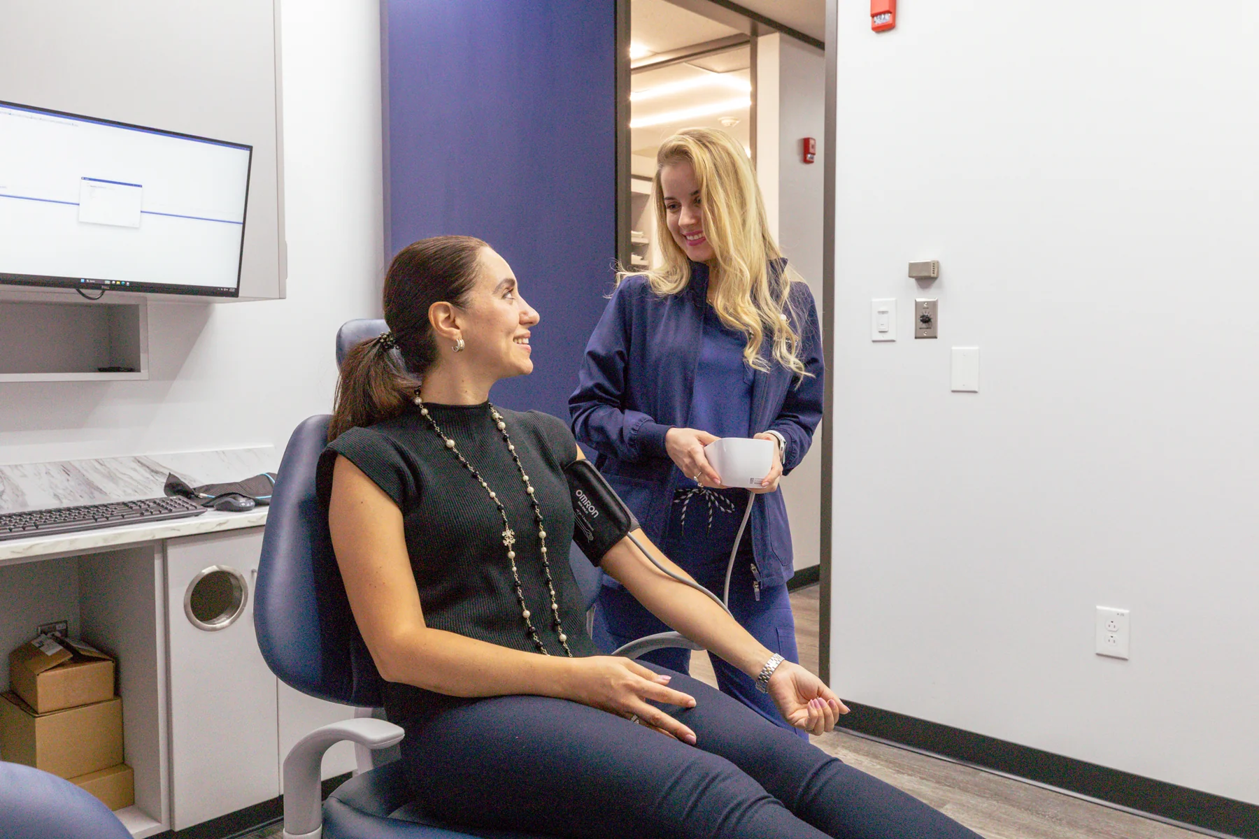 A relaxed conversation with a patient at Houston Dentistry at Memorial